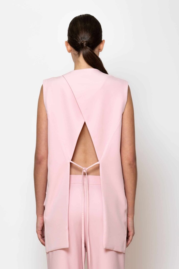 Open back double breasted sleeveless jacket
