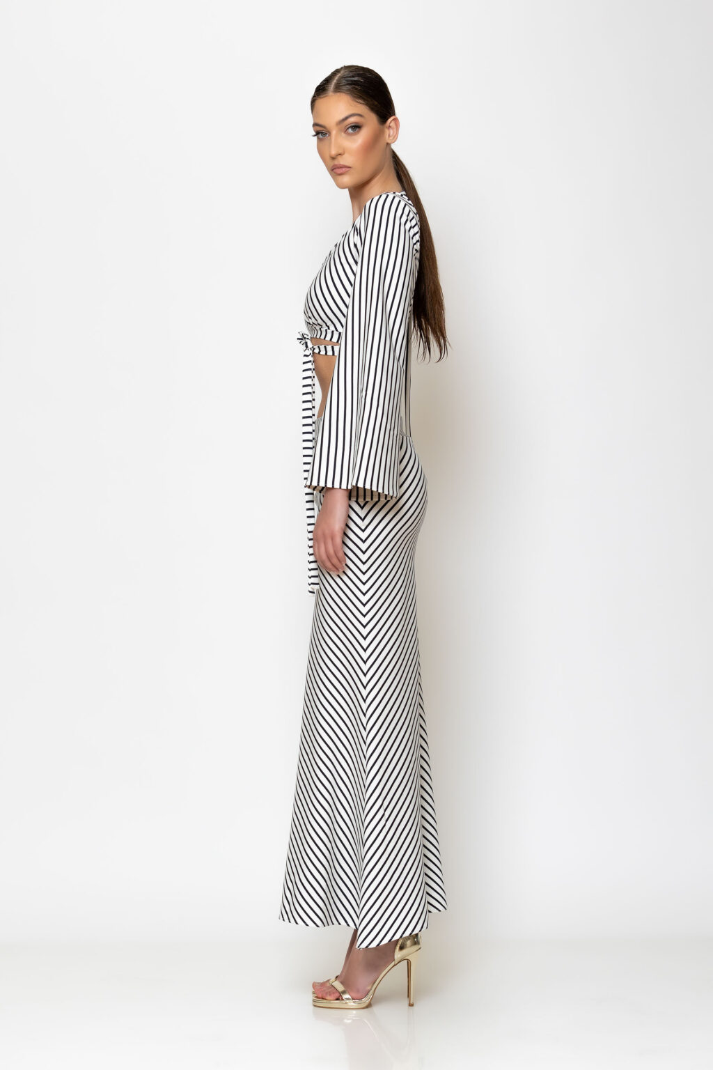 Cropped striped bell sleeve top.
