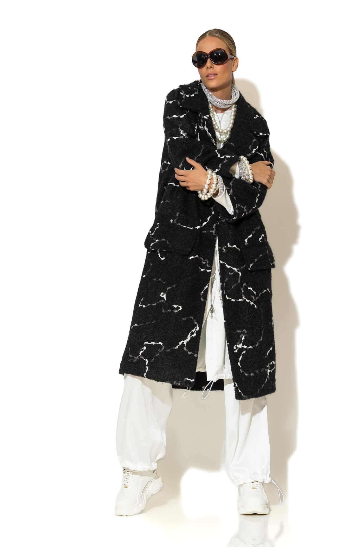 Women's long black bouclé jacquard coat – front view with buttons and flap pockets in black